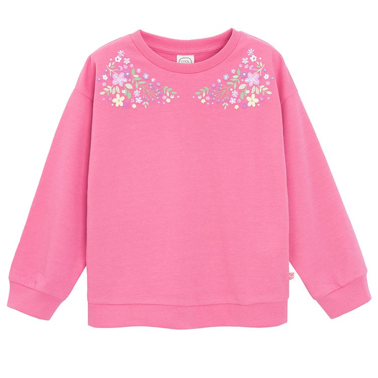 Pink sweatshirt with floral embroidery around the neckline