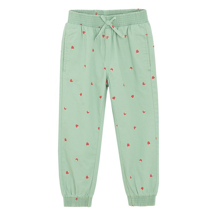 Green sweatpants with strawberries print