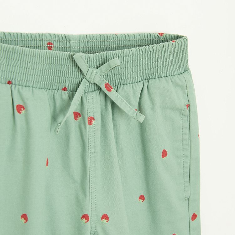 Green sweatpants with strawberries print