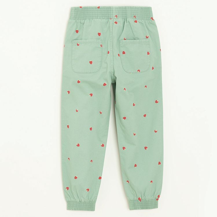 Green sweatpants with strawberries print