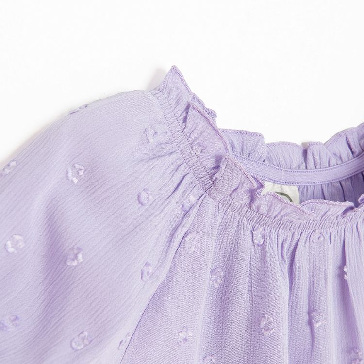 Purple  blouse with short puffy sleeves