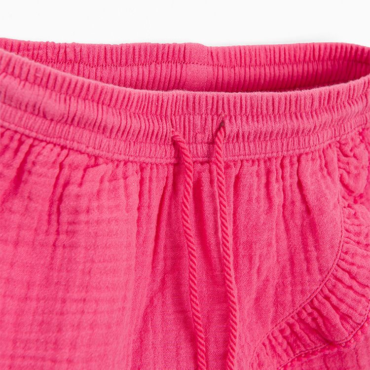 Fucshia wrap shorts with ruffles