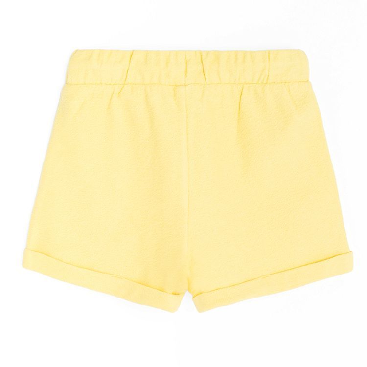 Yellow shorts with cord on the waist