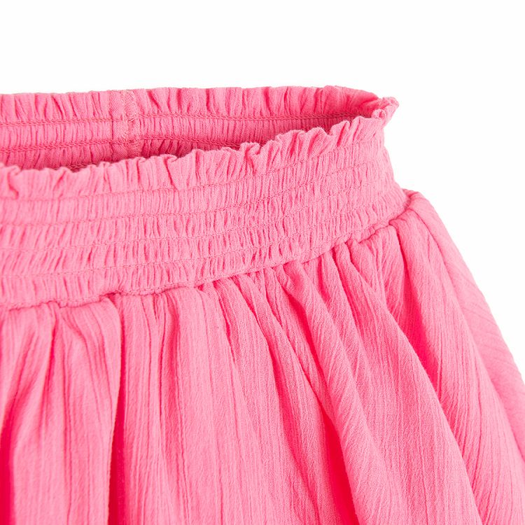 Pink skirt with high elastic waist and ruffle