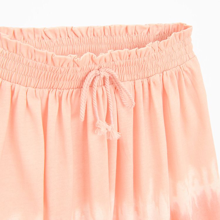 Peach T-shirt and tie dye skirt- 2 pieces