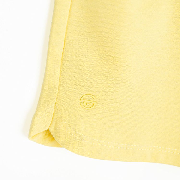 Yellow sports shorts with cord on the waist