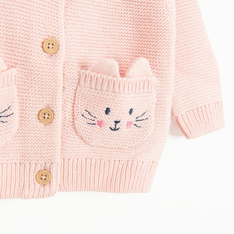 Pink button down jacket with bunnies on the side pockets