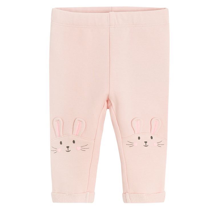 Pink leggings with bunny patter on the bottom