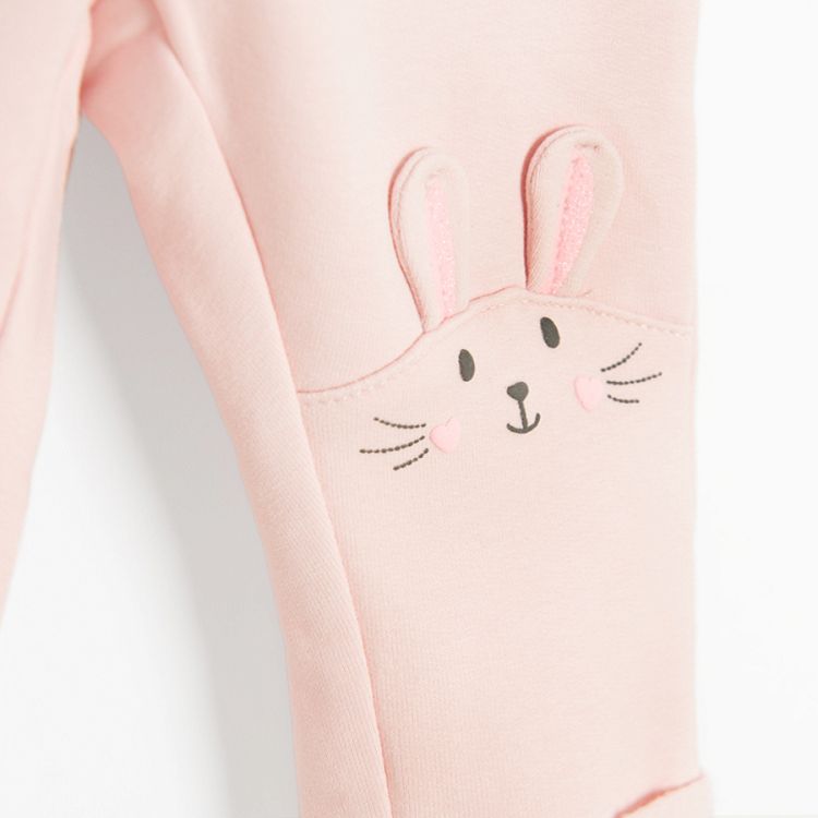 Pink leggings with bunny patter on the bottom