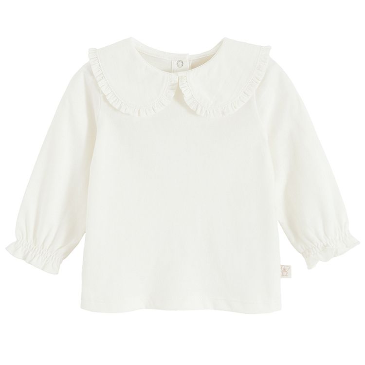 White long sleeve blouse with round collar and elastic around wrists