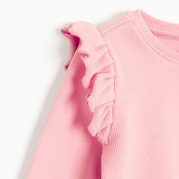 Pink blouse with ruffles