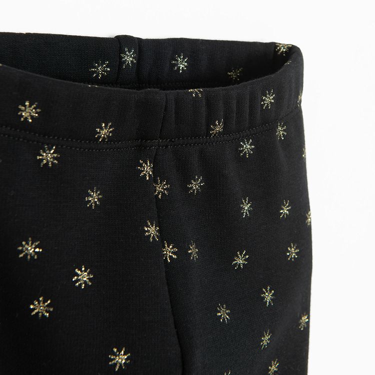 Black jeggings with gold stars