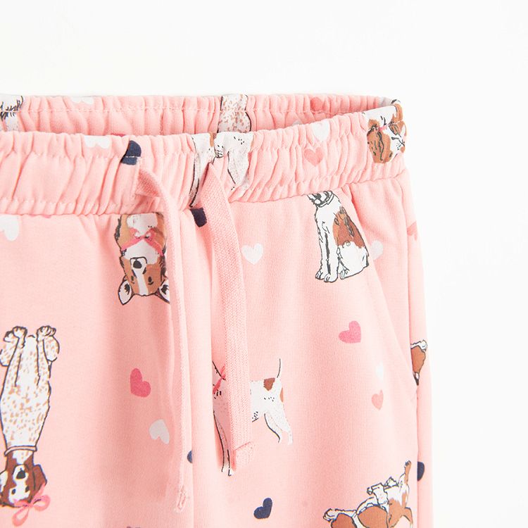 Pink jogging pants with dogs print