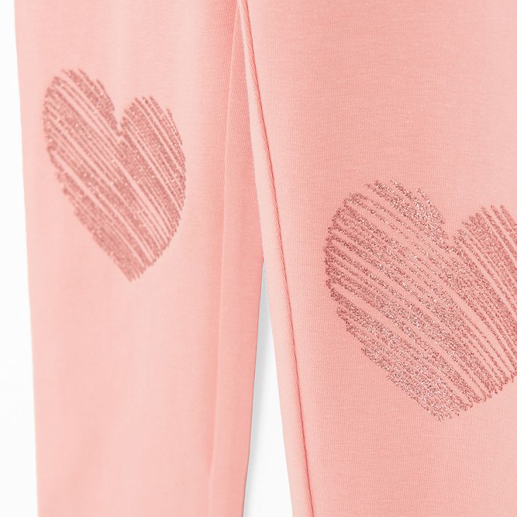 Pink leggings with hearts on the knees print