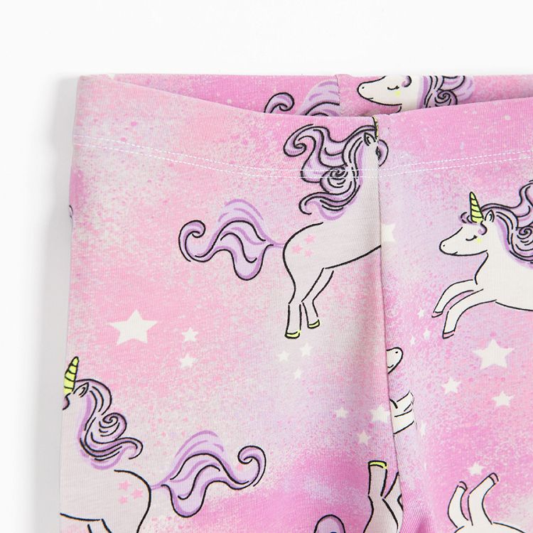 Purple leggings with unicorns print