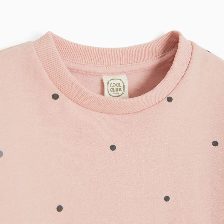 Pink sweatshirt with black dots