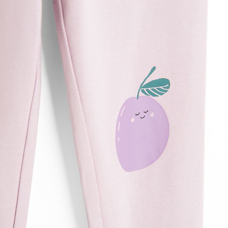 Violet leggings with plam fruit on the knees