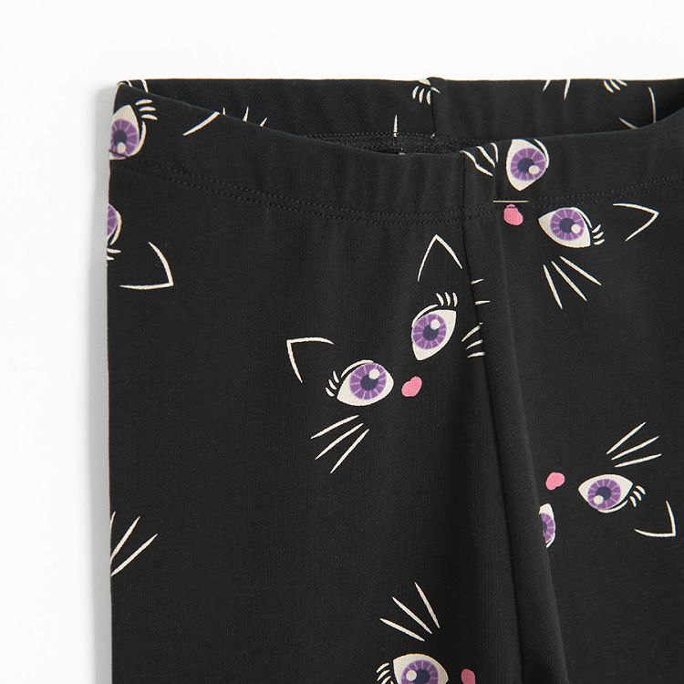 Black leggings with cat eyes print