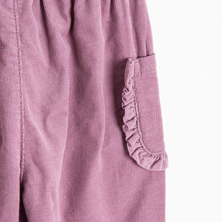 Violet trousers with external pockets