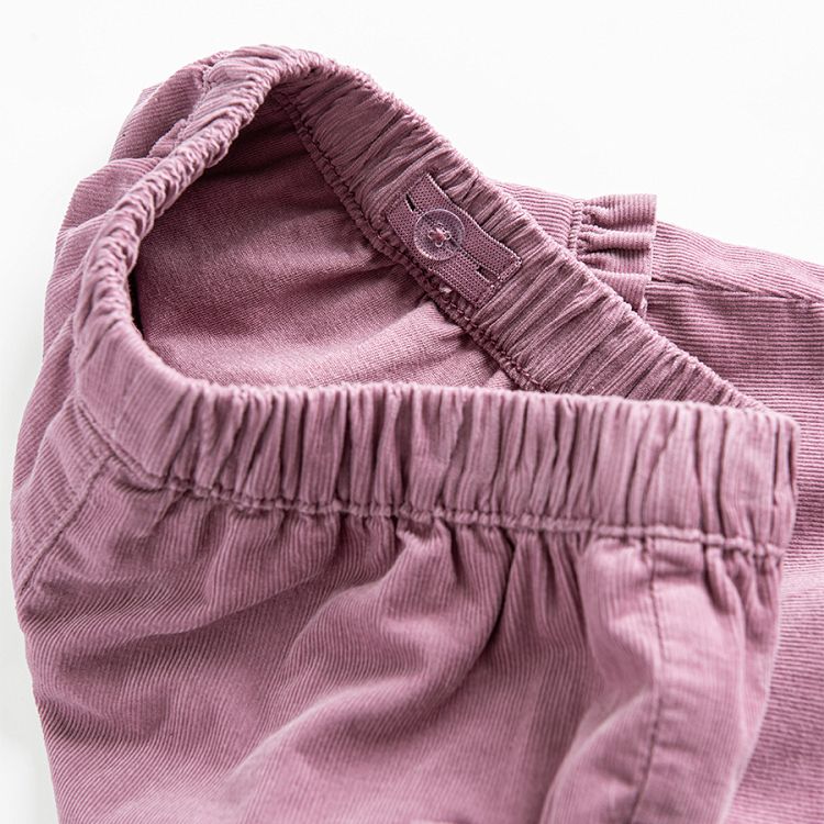 Violet trousers with external pockets