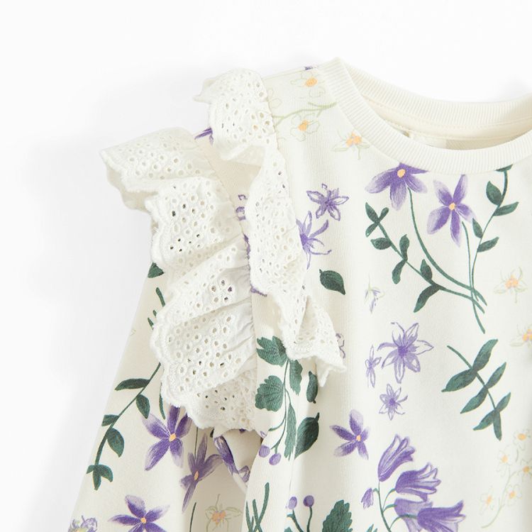 White sweatshirt with purple flowers and ruffles blouse