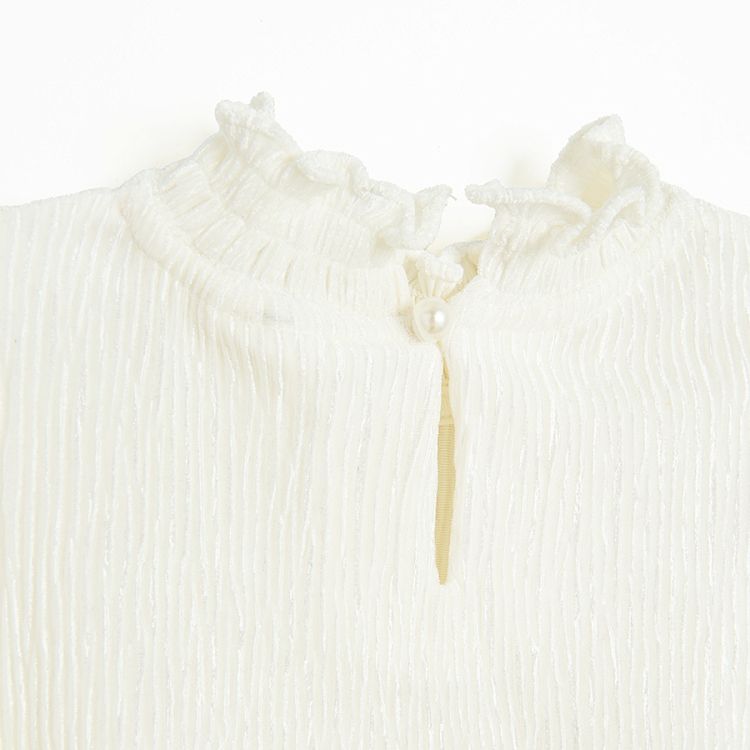 White turleneck blouse