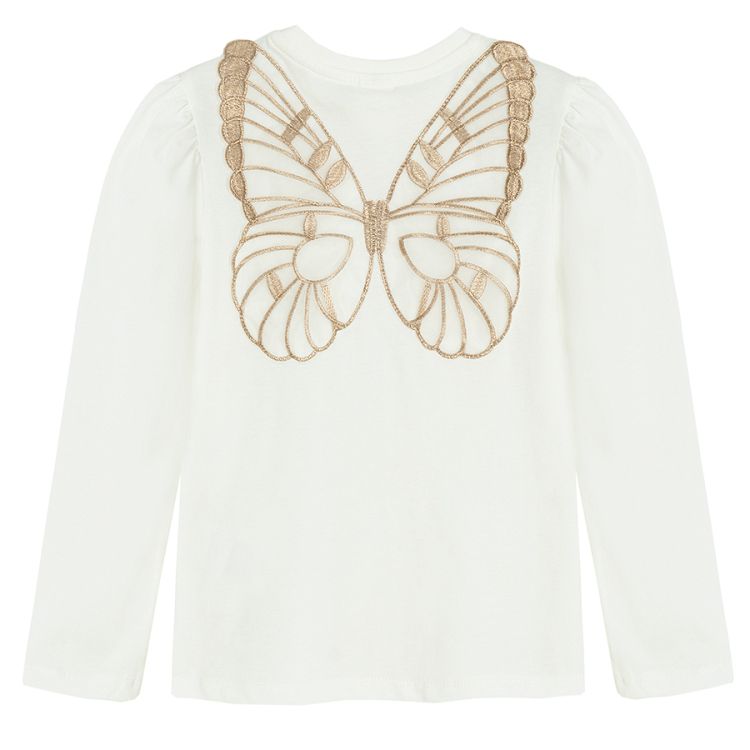 White long sleeve blouse with gold stars with fairy's wings on the back and skirt with stars set