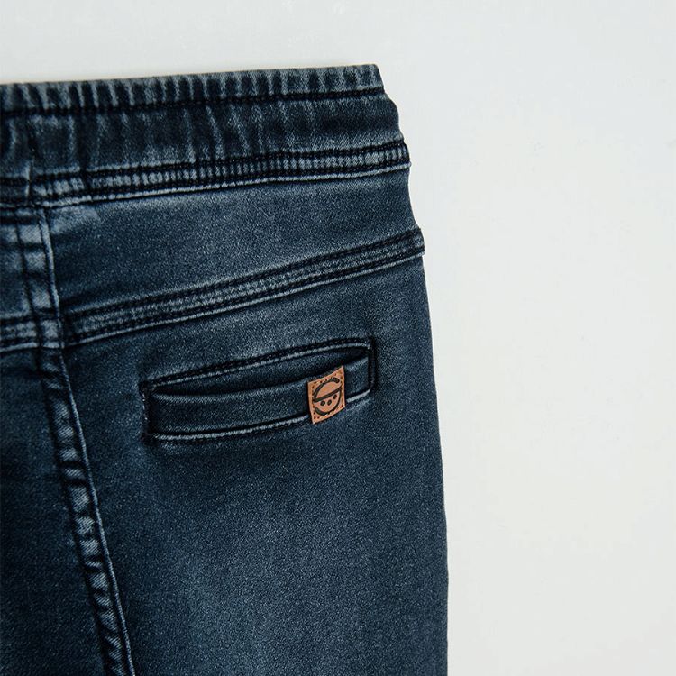 Denim trousers with adjustable waist