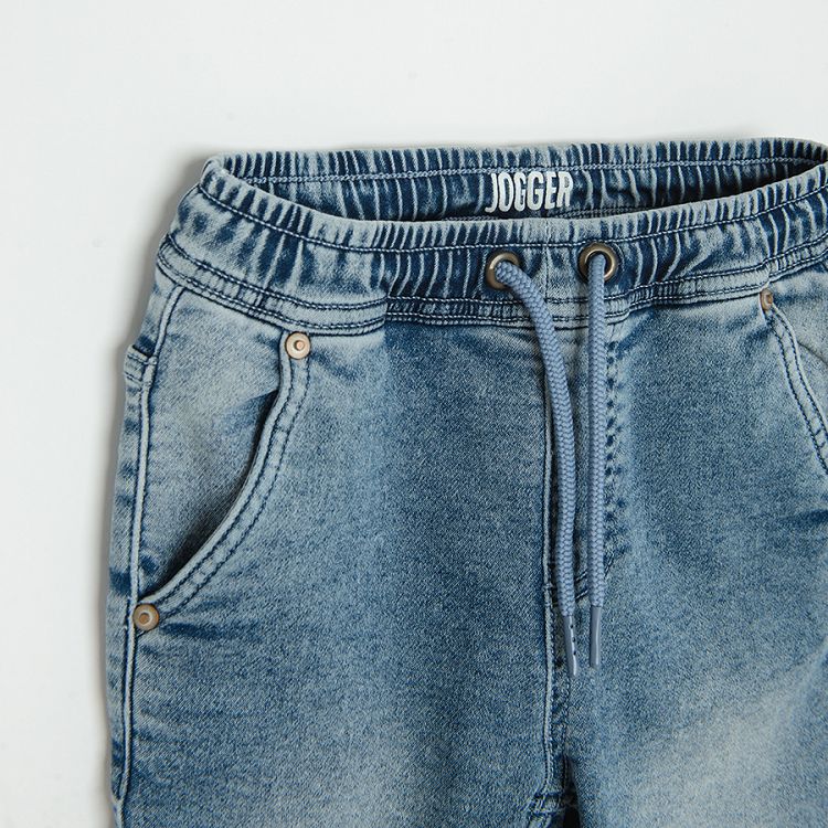 Denim trousers with corded waist