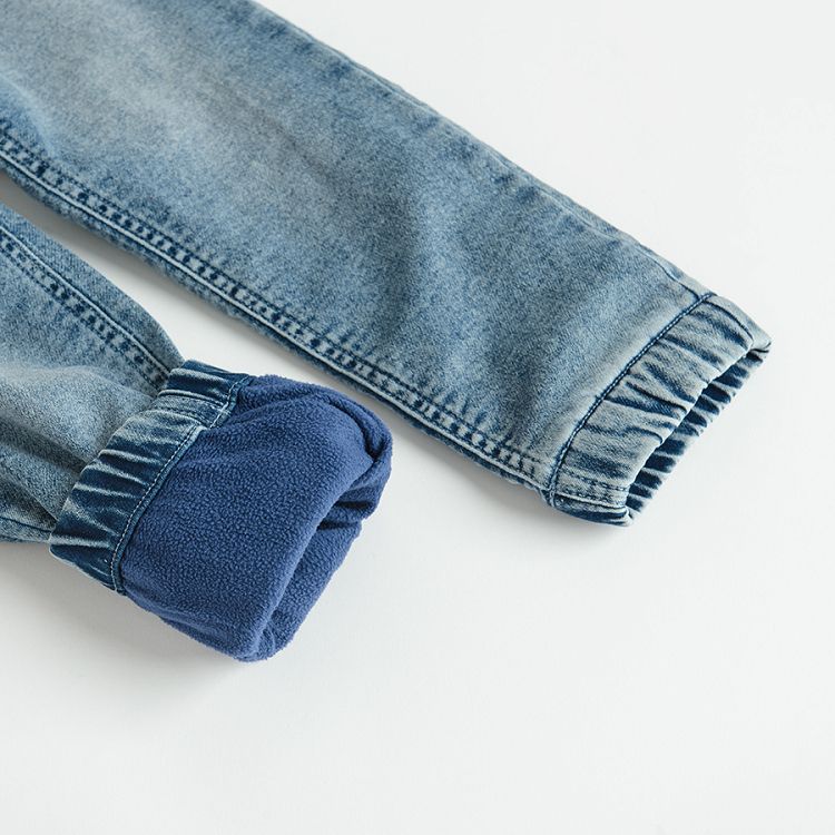 Denim trousers with corded waist