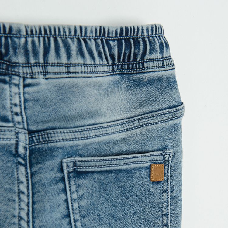 Denim trousers with corded waist