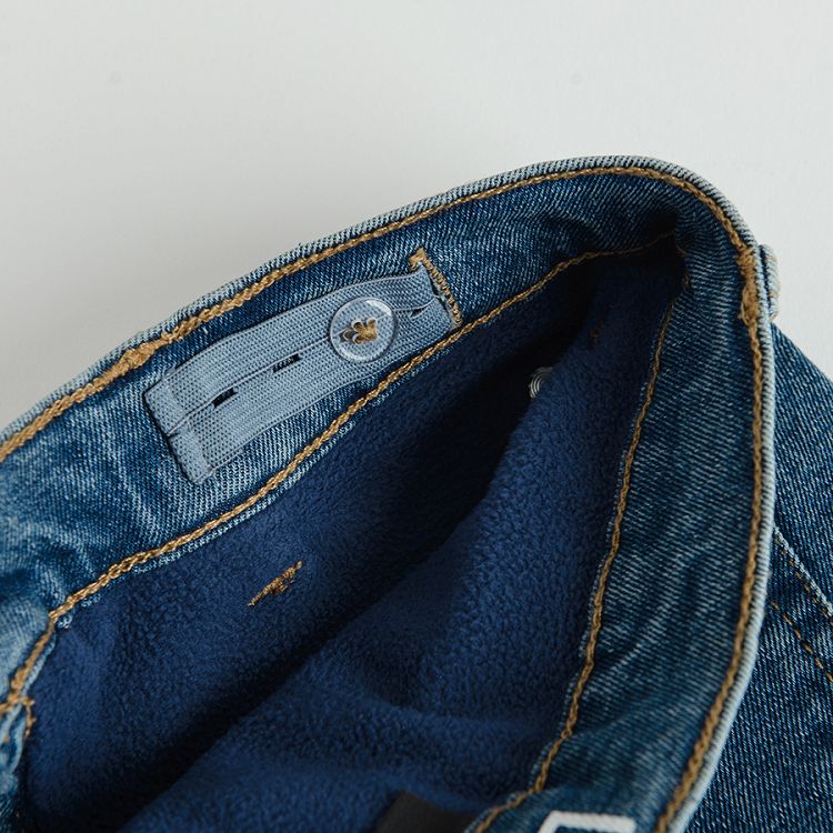 Denim trousers with fleece lining