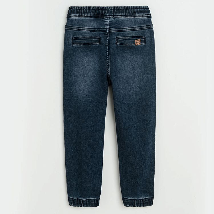 Denim trousers with adjustable waist