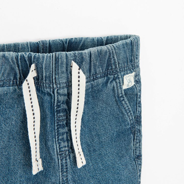 Denim pants with cord on the waist