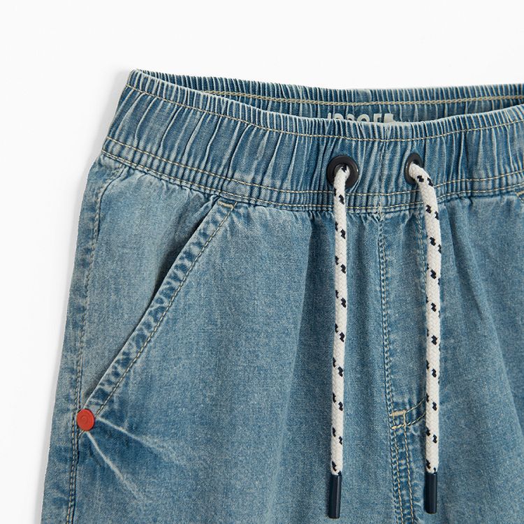 Denim trousers with cord