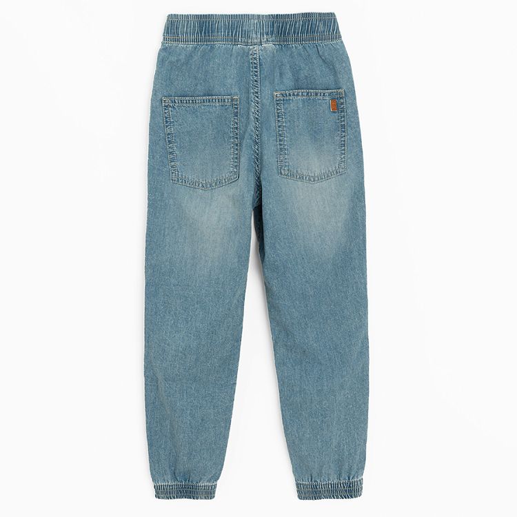 Denim trousers with cord