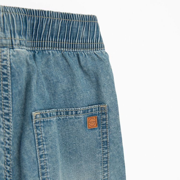 Denim trousers with cord