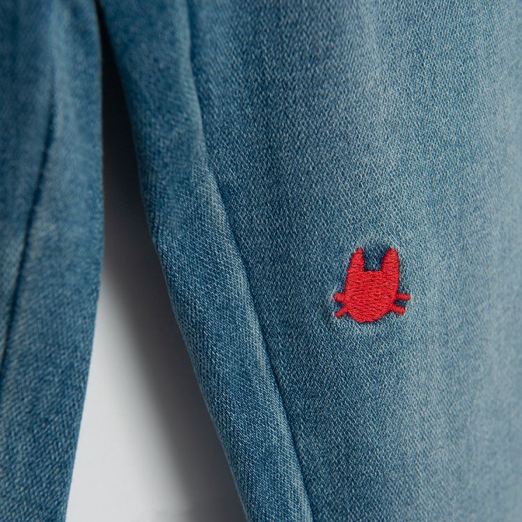 Denim trousers with small cats face embroidered