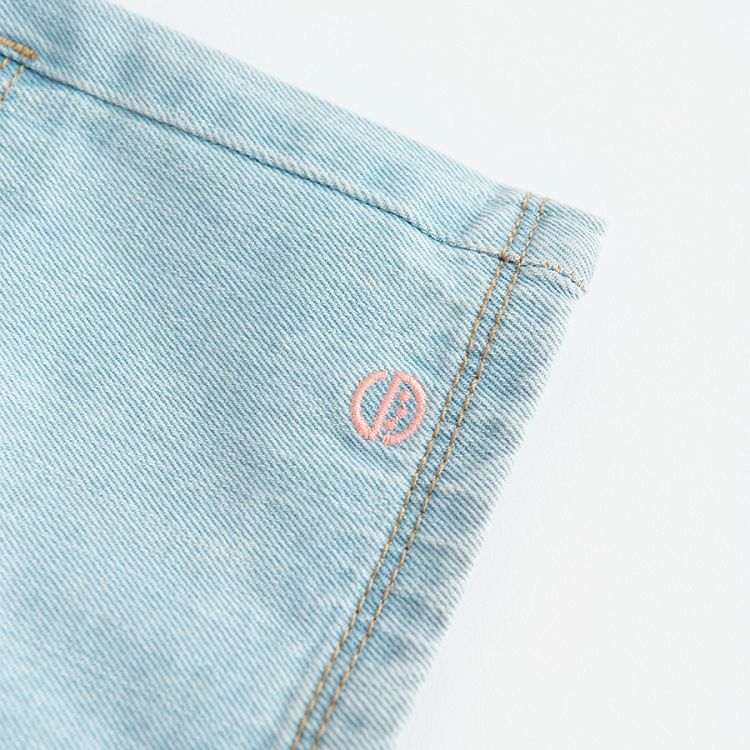 Blue denim shorts with striped white and pink belt