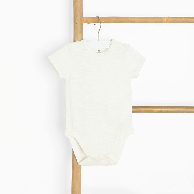 Beige short sleeve bodysuit and shorts dungaree set