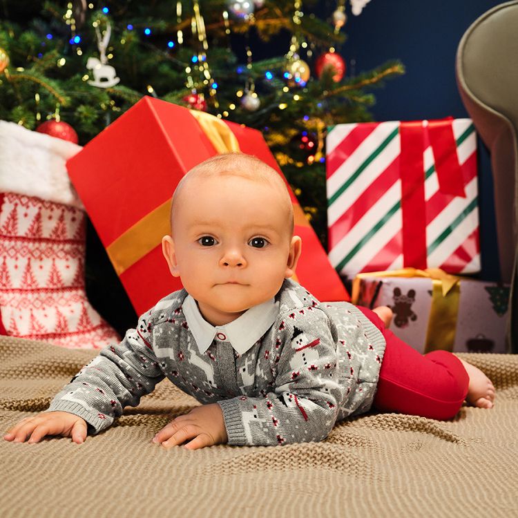 Grey sweatshirt with snowmen and raindeer print and red leggings