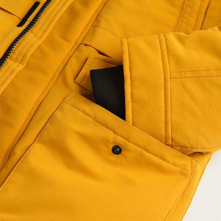 Yellow zip through with hood with furlike jacket