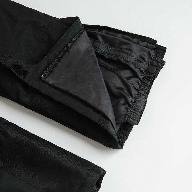 Black ski trousers