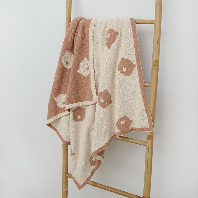 Brown and beige banket with bear print