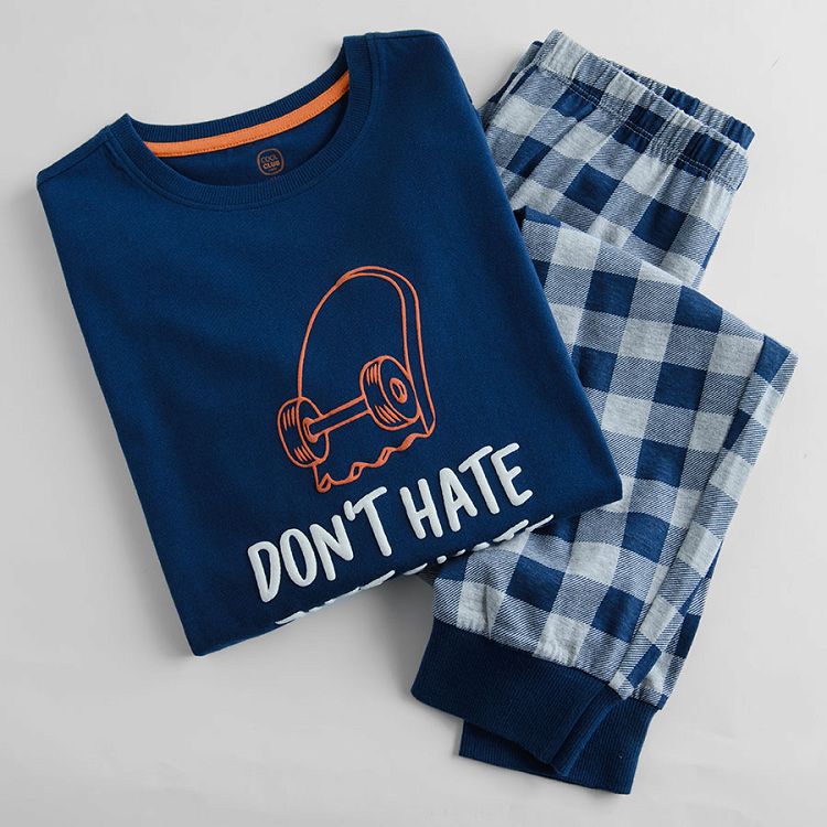 Blue pyjamas with skateboard print