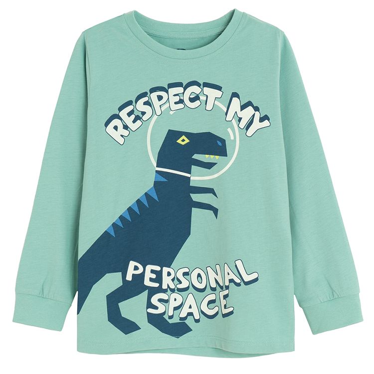 Light blue long sleeve and pants pyjamas with dinosaur print