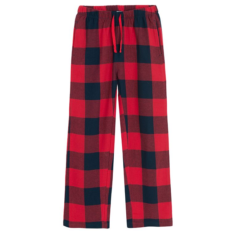 Blue long sleeve blouse and red and blue checked pants pyjamas