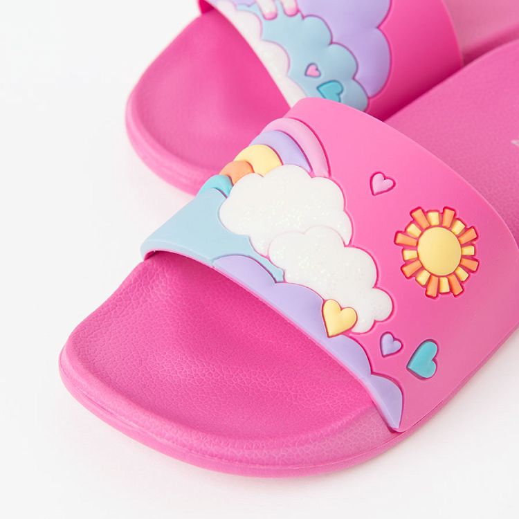 Pink flip flops with unicorn print