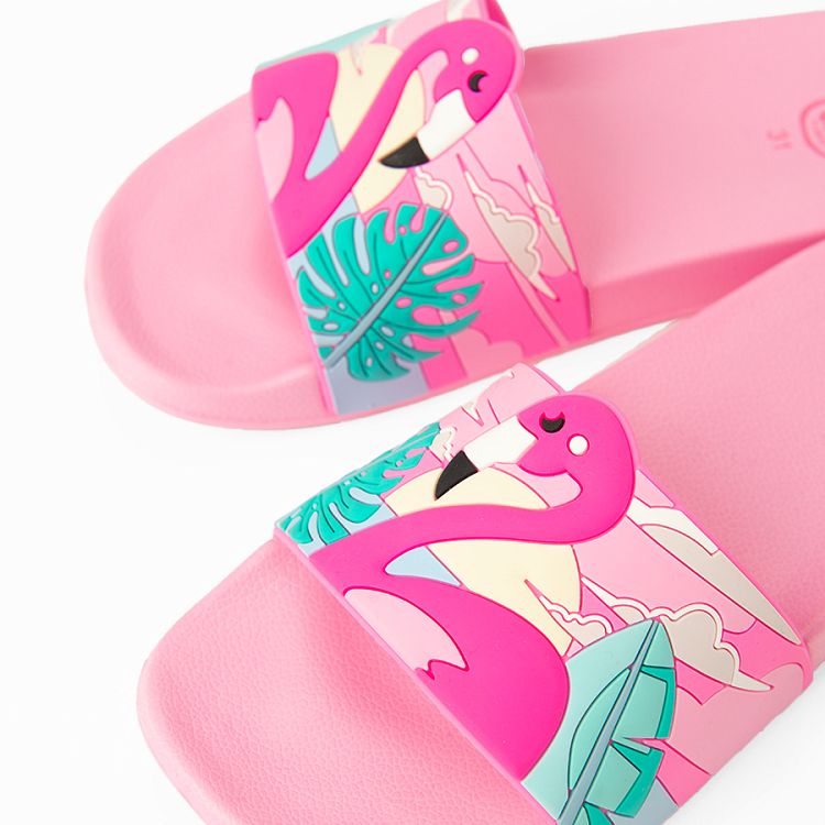 Pink flip flops with flamingo pattern