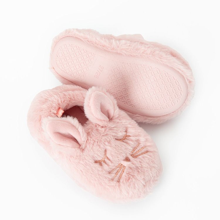 Pink home slippers with bunny shape